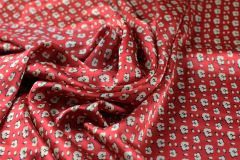 ткань терракотовый атлас с некрупным рисунком лео атлас шелк леопард красная Италия