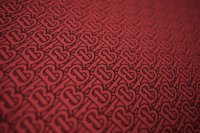 ткань красный полиэстер с логотипами (кади)