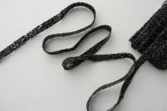 ткань тесьма из силиконовой ленты с черными камушками Италия